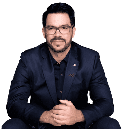 Tai Lopez, investor and entrepreneur, seated in a dark suit.
